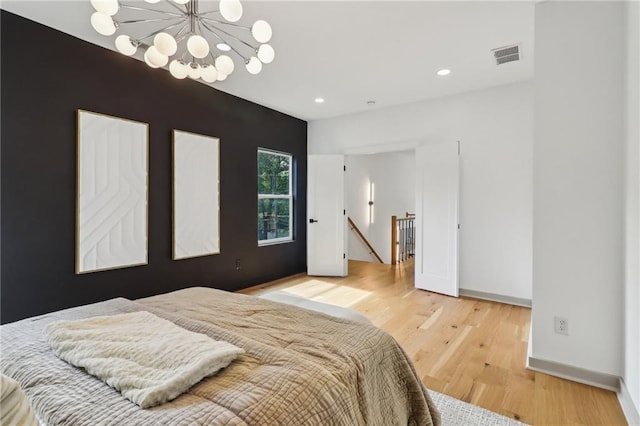1129 Victory Dr SW, Atlanta, GA 30310 - bedroom featuring baseboards, a chandelier, light wood-style floors, and recessed lighting