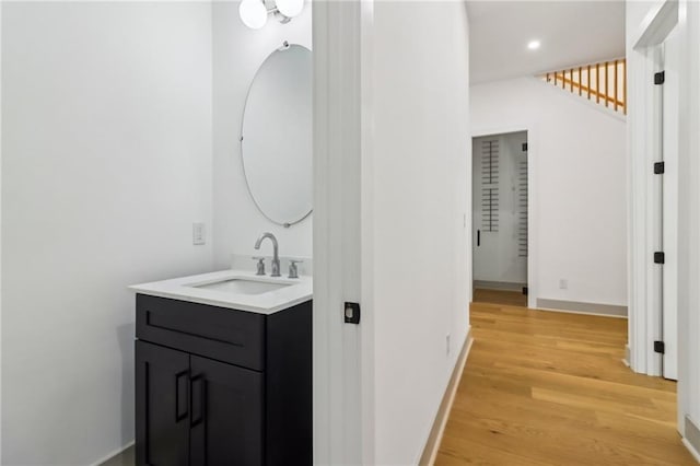 1129 Victory Dr SW, Atlanta, GA 30310 - bathroom with vanity, wood finished floors, recessed lighting, and baseboards