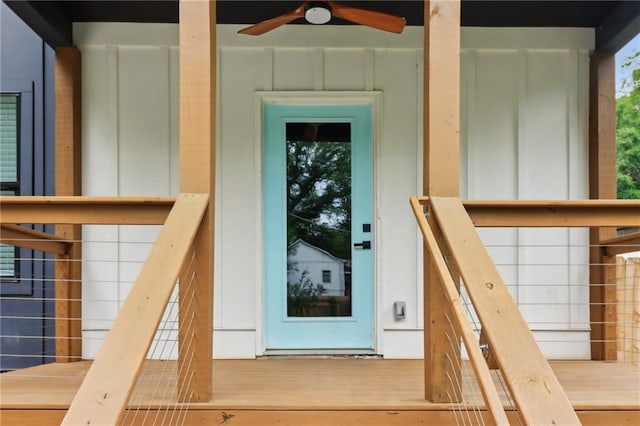 1129 Victory Dr SW, Atlanta, GA 30310 - view of exterior entry with a ceiling fan and board and batten siding