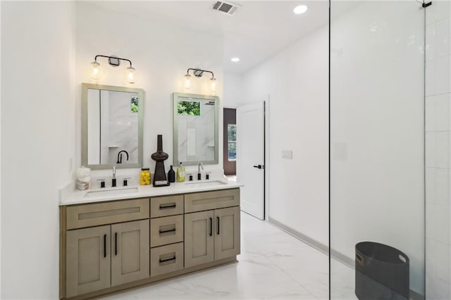 1129 Victory Dr SW, Atlanta, GA 30310 - full bath featuring marble look tile flooring, double vanity, and recessed lighting