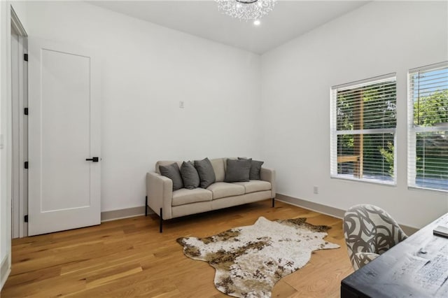 1129 Victory Dr SW, Atlanta, GA 30310 - home office featuring light wood-style floors, baseboards, and a chandelier
