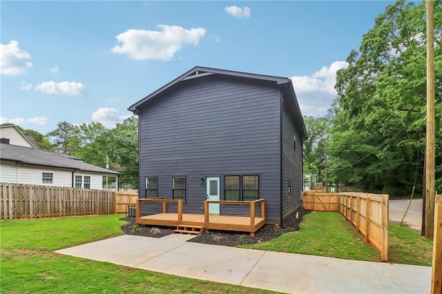 1129 Victory Dr SW, Atlanta, GA 30310 - back of house with a wooden deck and a patio