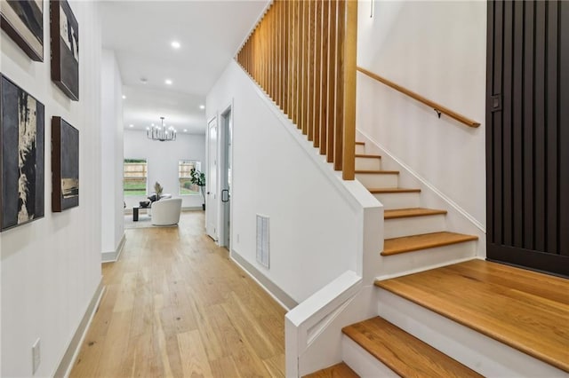1129 Victory Dr SW, Atlanta, GA 30310 - entrance foyer featuring light wood-style flooring, stairway, a chandelier, recessed lighting, and baseboards