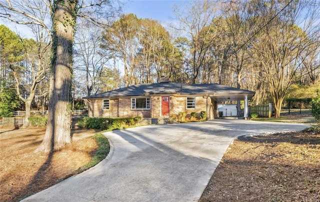 ranch-style house with a carport