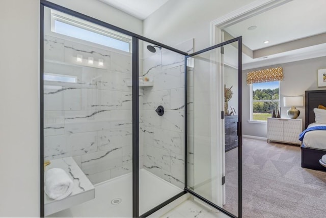 99 Silver Leaf Trce, Douglasville, GA 30134 - ensuite bathroom with a marble finish shower, plenty of natural light, and baseboards