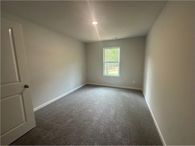 75 Emerald Ln, Covington, GA 30014 - carpeted empty room featuring baseboards