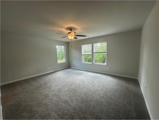 75 Emerald Ln, Covington, GA 30014 - carpeted empty room featuring baseboards and ceiling fan