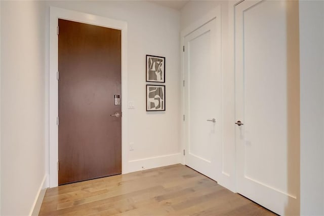 hall featuring light wood-type flooring