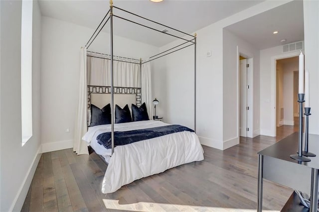 bedroom featuring dark hardwood / wood-style floors