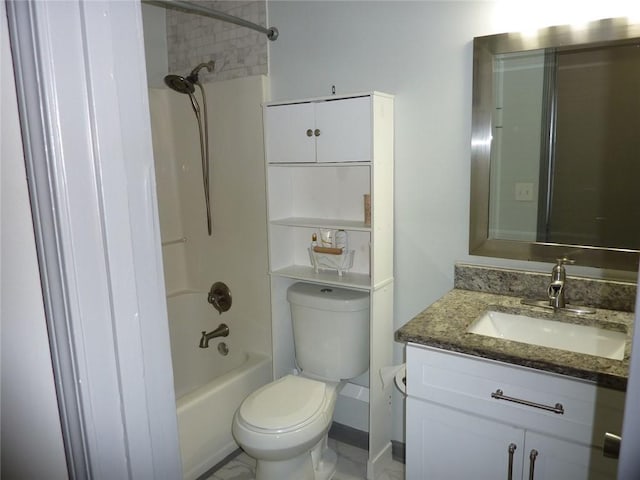 bathroom featuring shower / washtub combination, vanity, and toilet