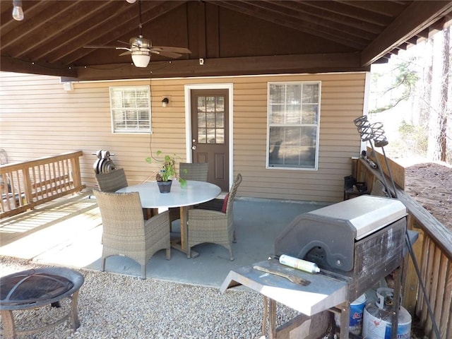 view of patio / terrace with a ceiling fan and outdoor dining space