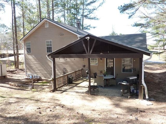 rear view of property with a patio area