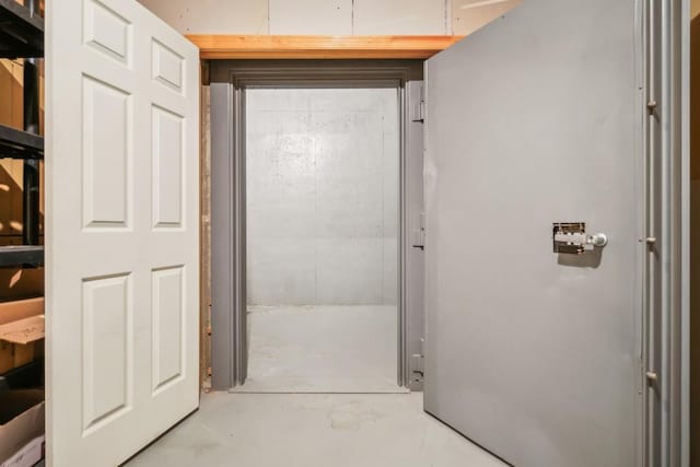 bathroom featuring concrete flooring