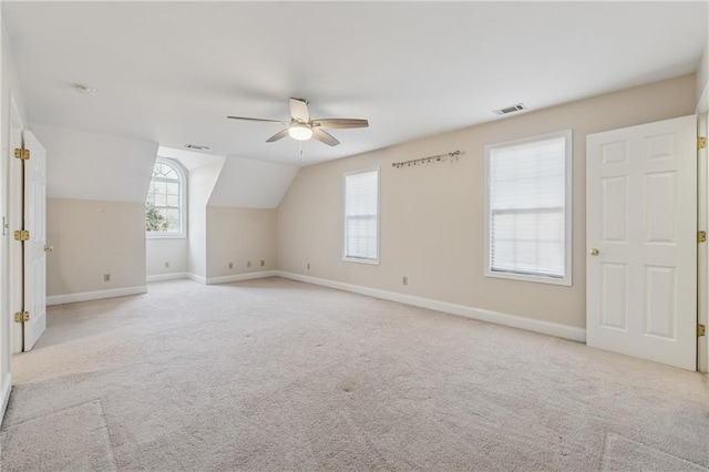 37 Long Branch Way, Dahlonega, GA 30533 - additional living space with light colored carpet, a ceiling fan, visible vents, lofted ceiling, and baseboards