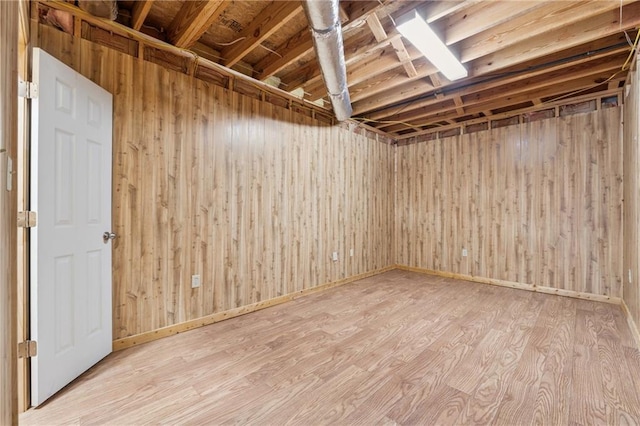 37 Long Branch Way, Dahlonega, GA 30533 - below grade area with wood walls, baseboards, and wood finished floors