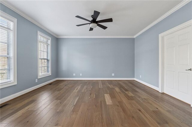 37 Long Branch Way, Dahlonega, GA 30533 - unfurnished room with visible vents, baseboards, a ceiling fan, hardwood / wood-style flooring, and crown molding