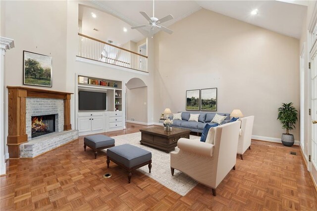37 Long Branch Way, Dahlonega, GA 30533 - living room featuring built in features, ceiling fan, high vaulted ceiling, and baseboards