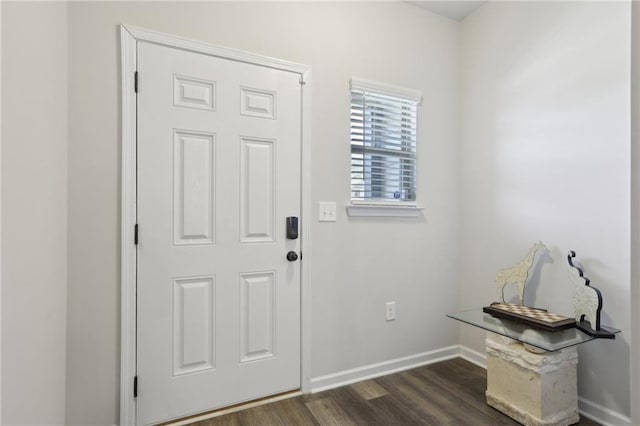 entryway with dark hardwood / wood-style floors