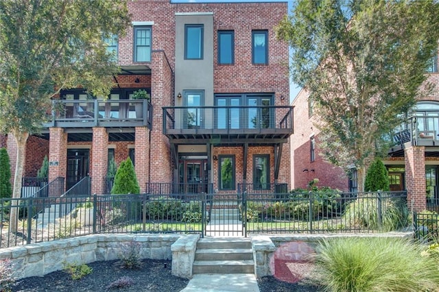 view of property with a balcony