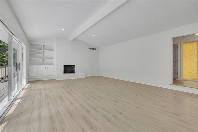 4717 Westhampton Dr, Tucker, GA 30084 - unfurnished living room featuring light wood finished floors, a brick fireplace, baseboards, and built in shelves