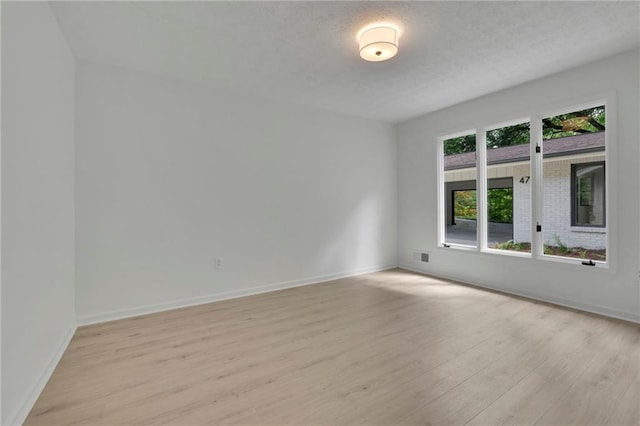 4717 Westhampton Dr, Tucker, GA 30084 - unfurnished room featuring light wood-style floors and baseboards