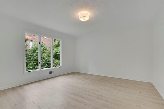 4717 Westhampton Dr, Tucker, GA 30084 - empty room with light wood-style flooring and baseboards