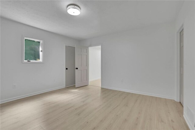 4717 Westhampton Dr, Tucker, GA 30084 - unfurnished room with light wood-style flooring and baseboards