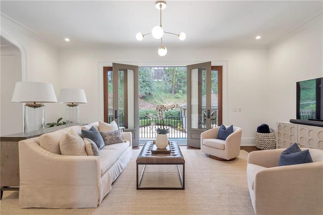 living area featuring baseboards, ornamental molding, wood finished floors, and recessed lighting