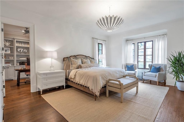 bedroom featuring dark wood-type flooring and ornamental molding