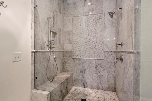 full bathroom featuring a stall shower