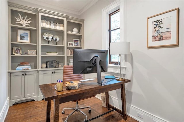 home office featuring ornamental molding, dark wood-style flooring, and a healthy amount of sunlight