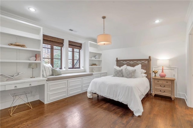 bedroom featuring ornamental molding, dark wood-style flooring, visible vents, and recessed lighting