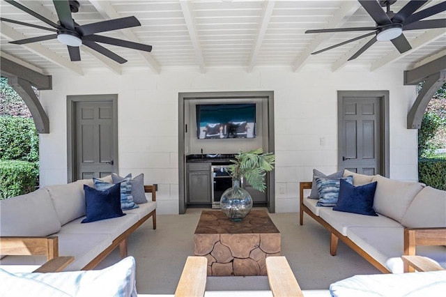 view of patio / terrace with a ceiling fan and outdoor lounge area