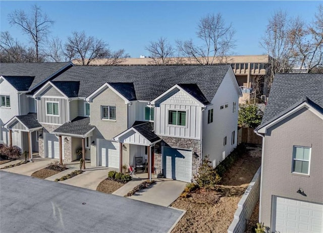 townhome / multi-family property featuring a garage