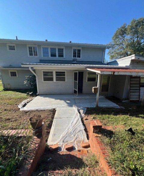 rear view of house with a patio area