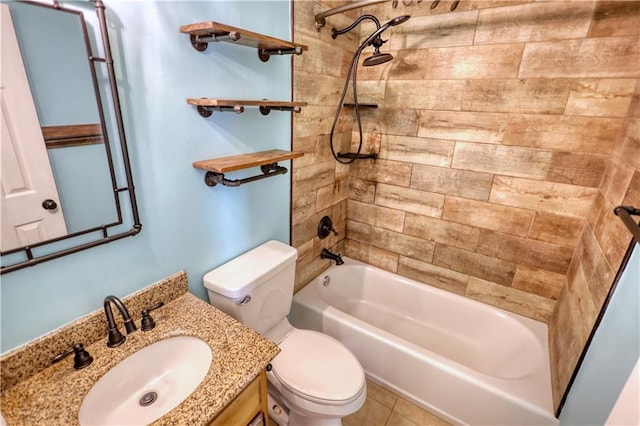 full bathroom featuring tiled shower / bath combo, vanity, and toilet