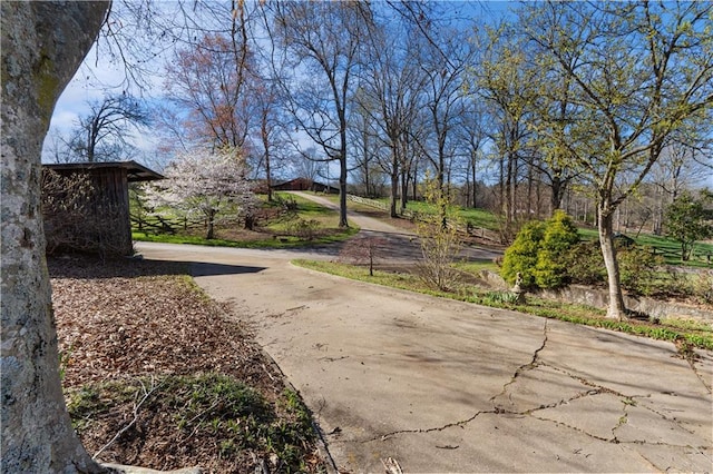 view of home's community with driveway