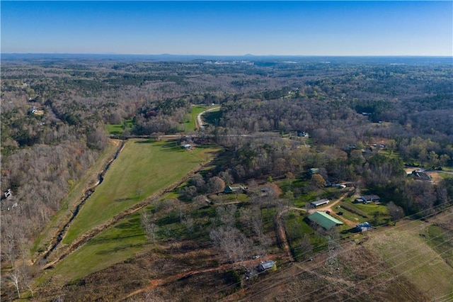 bird's eye view with a rural view and a forest view