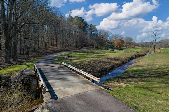 view of home's community featuring a yard