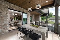 rear view of house featuring a patio