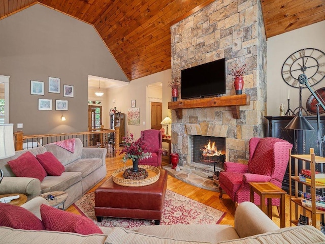 46 Bee Balm Way, Big Canoe, GA 30143 - living room with wood finished floors, a stone fireplace, high vaulted ceiling, and wood ceiling