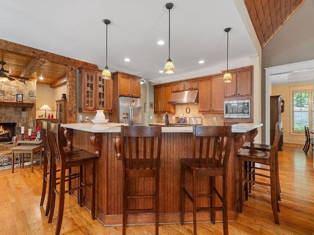 46 Bee Balm Way, Big Canoe, GA 30143 - kitchen with stainless steel appliances, under cabinet range hood, light wood-type flooring, and recessed lighting