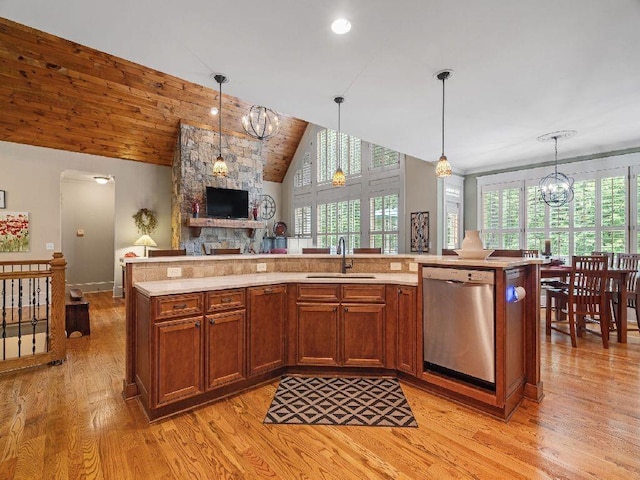 46 Bee Balm Way, Big Canoe, GA 30143 - kitchen featuring stainless steel dishwasher, open floor plan, light wood-type flooring, healthy amount of natural light, and high vaulted ceiling