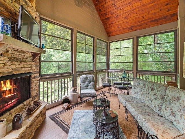 46 Bee Balm Way, Big Canoe, GA 30143 - sunroom featuring lofted ceiling, an outdoor living space with a fireplace, and outdoor dining space