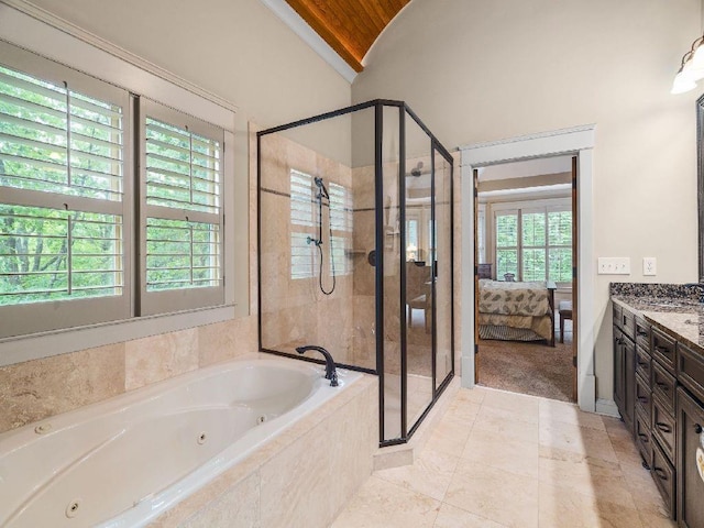 46 Bee Balm Way, Big Canoe, GA 30143 - ensuite bathroom featuring a stall shower, a tub with jets, vanity, lofted ceiling, and tile patterned floors
