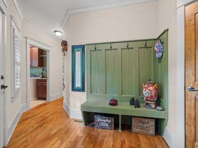 46 Bee Balm Way, Big Canoe, GA 30143 - mudroom with crown molding and wood finished floors