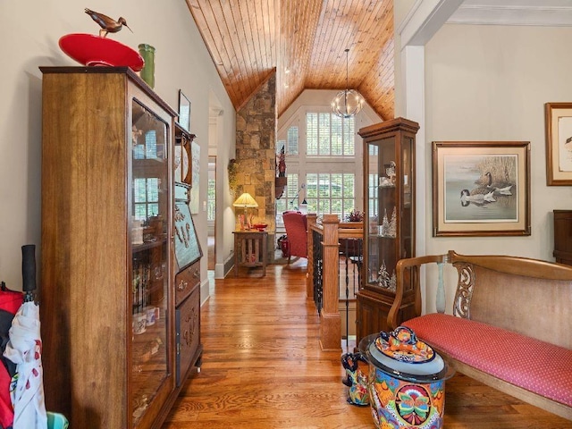 46 Bee Balm Way, Big Canoe, GA 30143 - sitting room featuring wooden ceiling, lofted ceiling, a chandelier, and wood finished floors