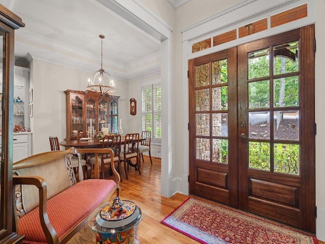 46 Bee Balm Way, Big Canoe, GA 30143 - foyer featuring a chandelier, light wood finished floors, french doors, and crown molding