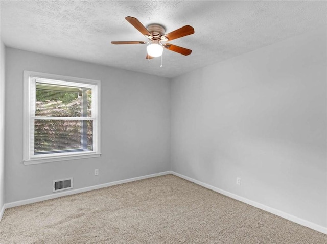 4720 Hull Rd, Conyers, GA 30094 - empty room featuring carpet floors, a textured ceiling, and ceiling fan