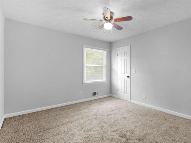 4720 Hull Rd, Conyers, GA 30094 - carpeted spare room featuring ceiling fan and a textured ceiling